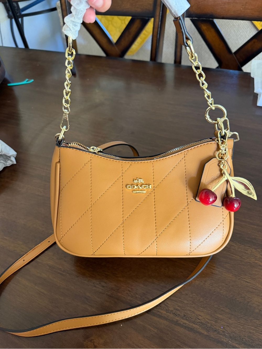 Coach Tan Quilted Crossbody Bag with Cherry Charm